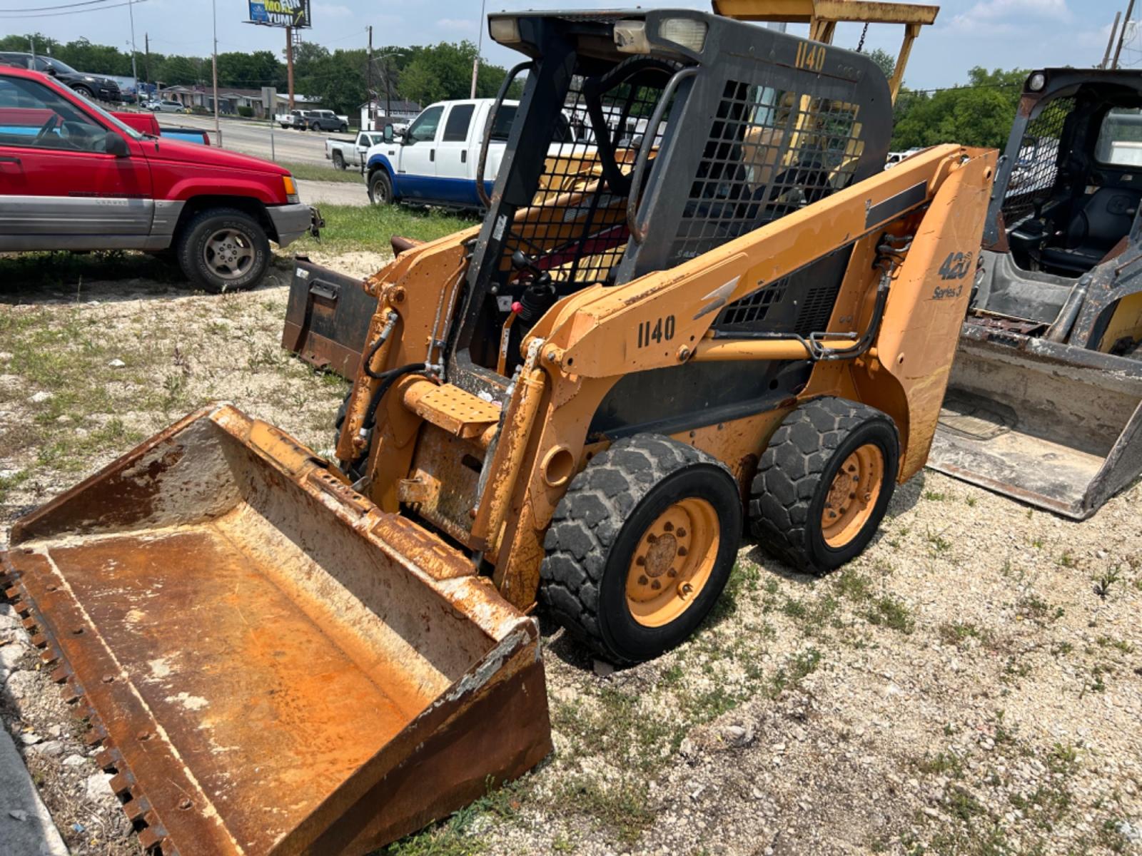2009 Yellow Case 420 series 3 (NAM413641) , located at 1687 Business 35 S, New Braunfels, TX, 78130, (830) 625-7159, 29.655487, -98.051491 - Photo #0